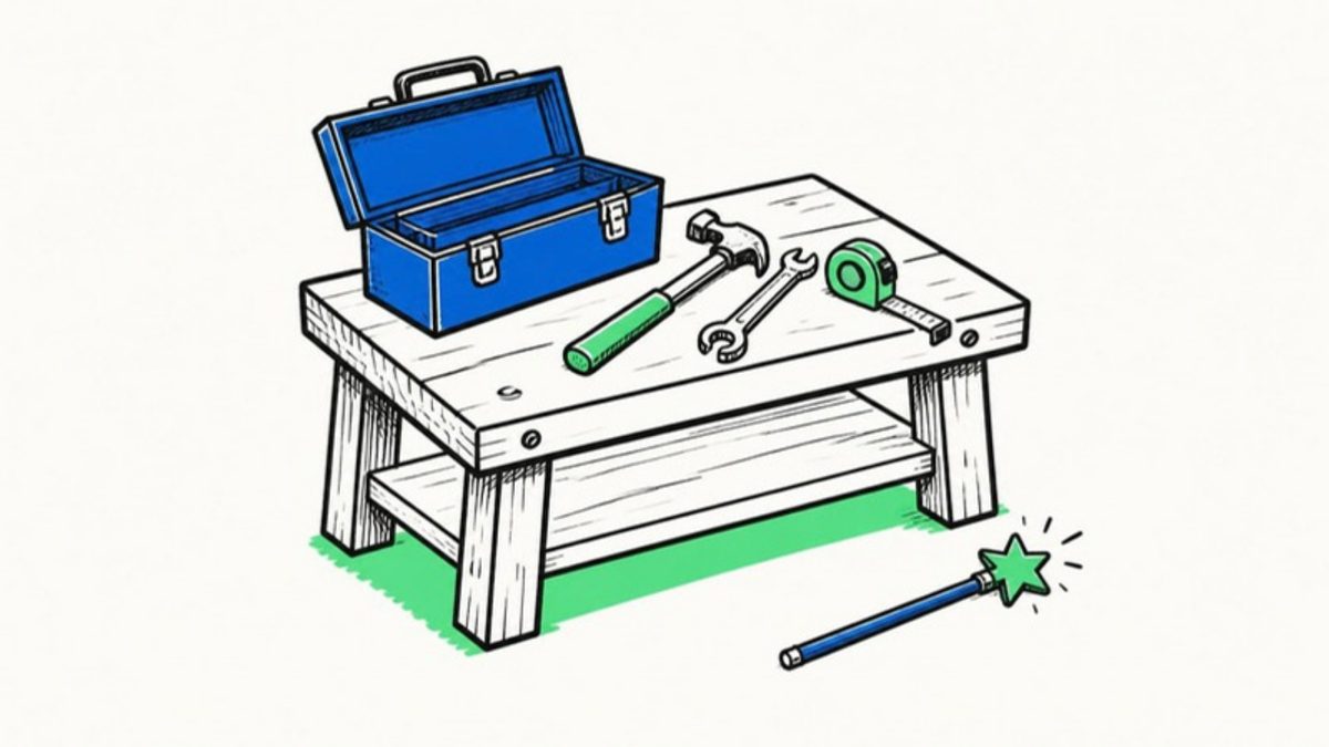 A drawing of a workbench with a toolbox, a hammer, a spanner and a tape measure laid out, and a magic wand lying unused on the floor